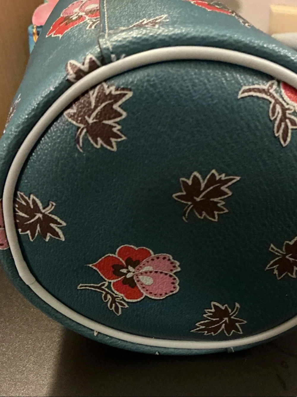 Coach Teal Floral Mini Drawstring Bucket Bag (rim has wear)